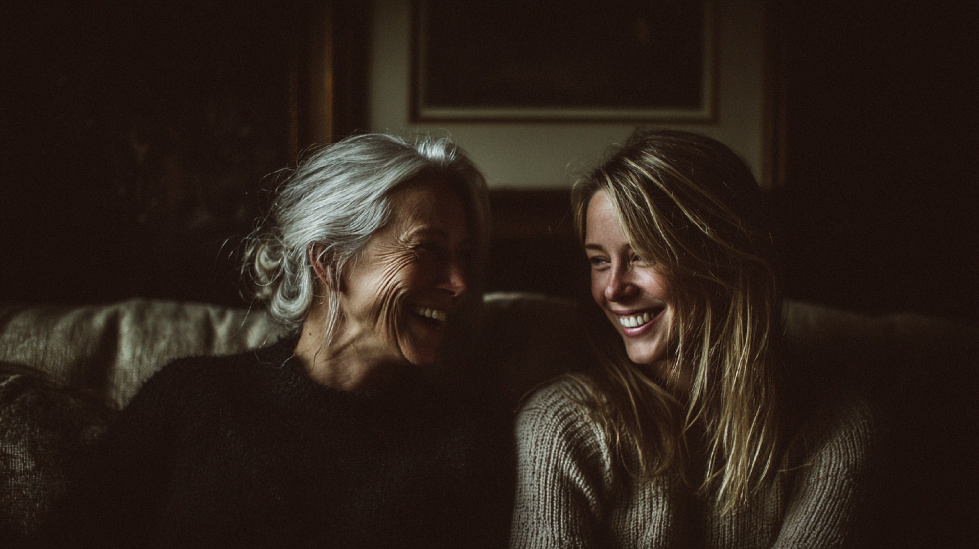 Two women laughing together